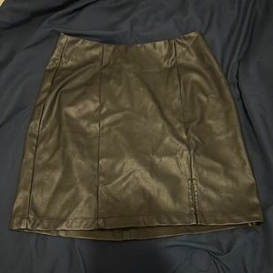 Black Leather Skirt. Had a little slit on the left side. XS. Aeropostal